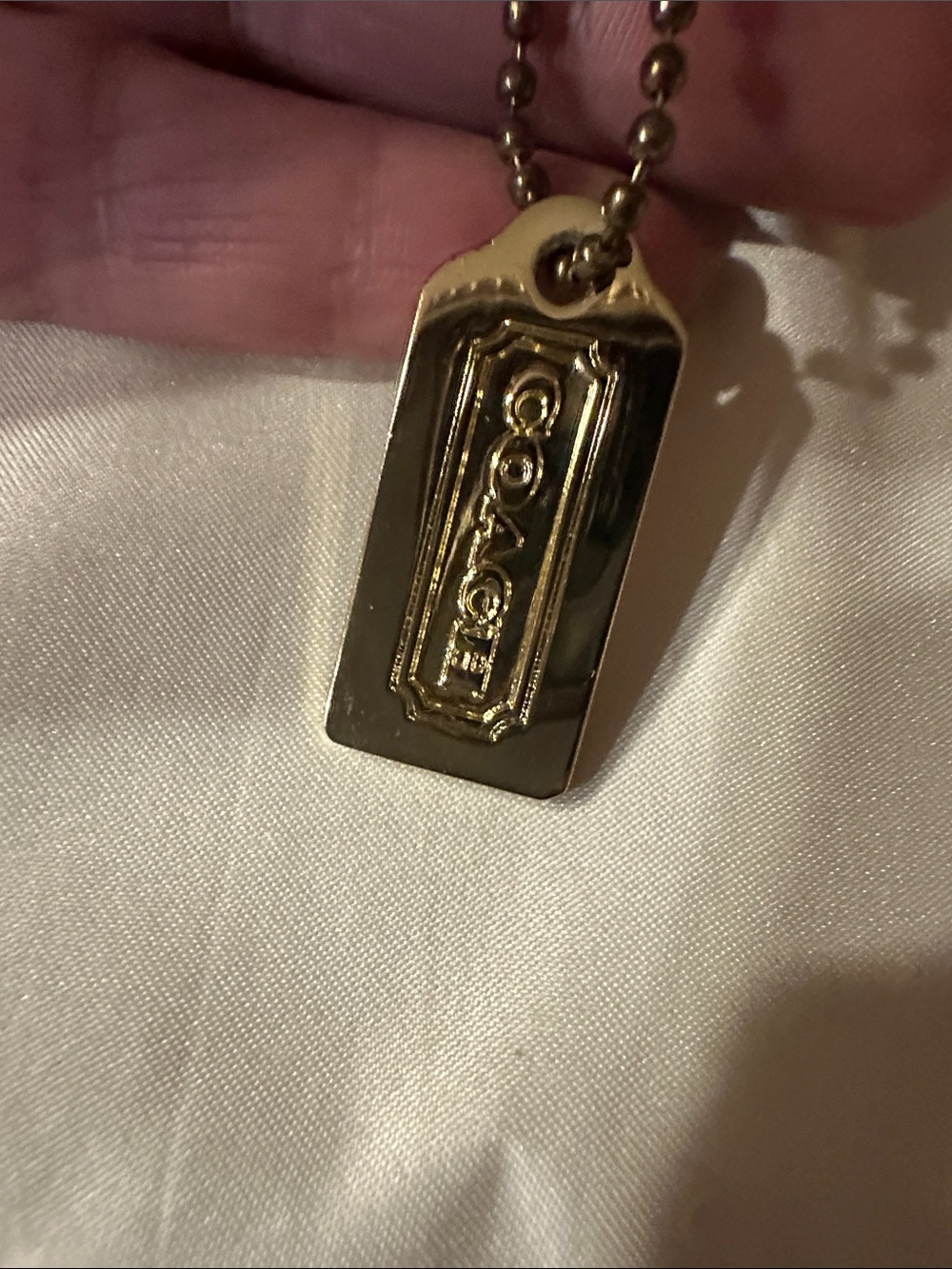 Coach metal gold tone Hangtag-small